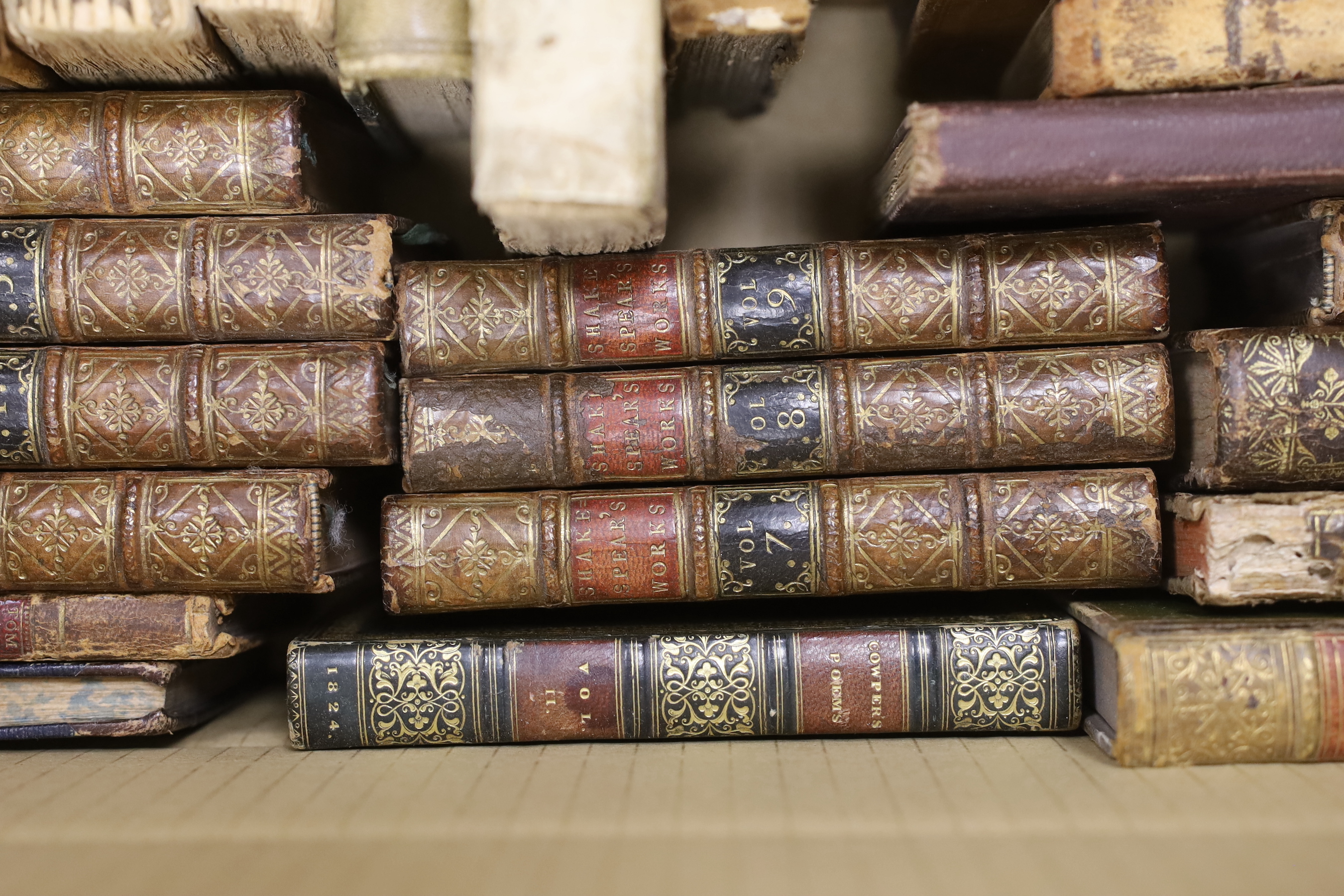 A group of assorted leather bindings